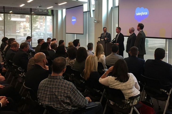 Indianapolis Mayor Joe Hogsett takes the podium flanked by Scott McCorkle (left) and Governor Mike Pence at this morning's Salesforce Tower announcement.