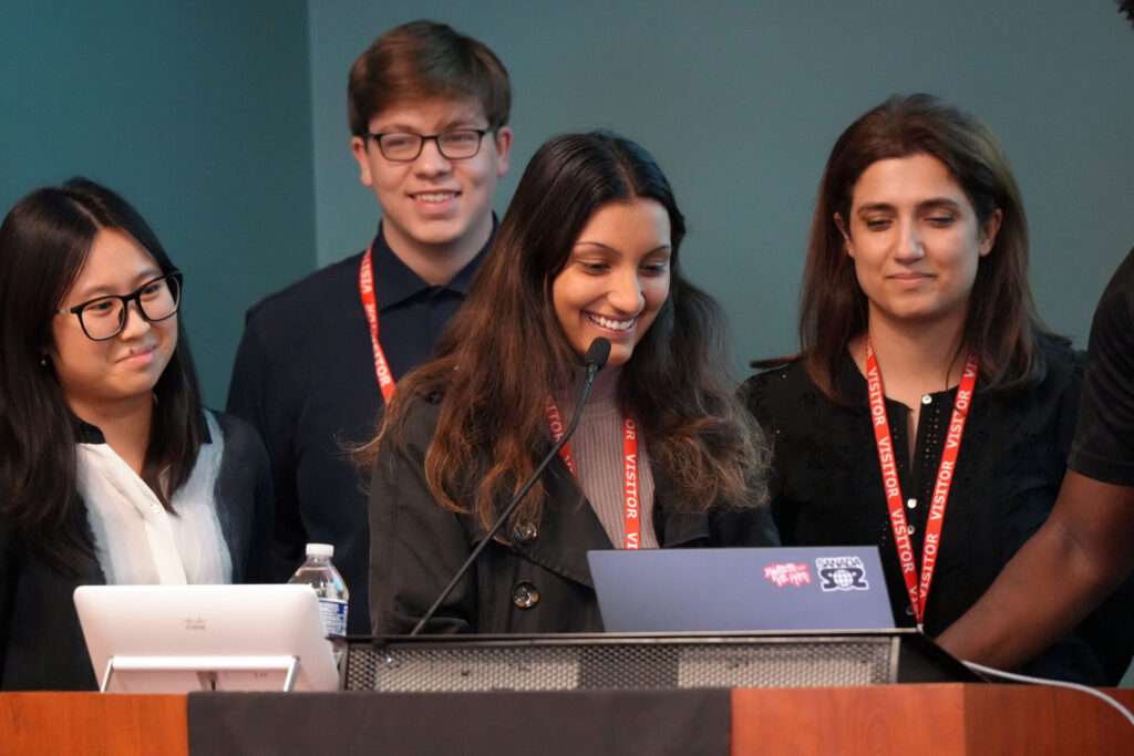 Cynthia Hu, Seth Poindexter, Srishti Maurya, and Shahrzad Ghadiri present as part of Team 2, which placed second in the final competition.