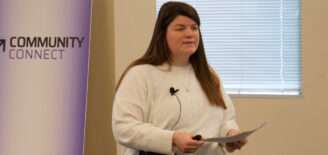 Sally Reasoner speaking at Community Connect