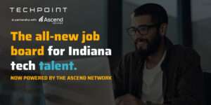 TechPoint and Ascend Indiana promotional graphic for the new Indiana tech job board, featuring a man smiling while working on a laptop and text reading, “The all-new job board for Indiana tech talent.”