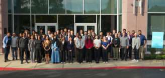 Group photo of 2026 MISO Xtern Challenge participants and staff gathered outside MISO’s Carmel headquarters.