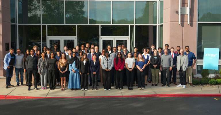 Group photo of 2026 MISO Xtern Challenge participants and staff gathered outside MISO’s Carmel headquarters.