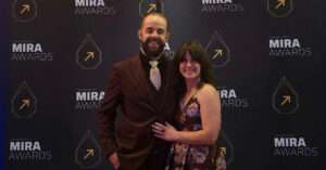 Crowfly founders Nickolai Christiansen and Jacqui Peterschmidt pose for a photo at the 2026 Mira Awards.