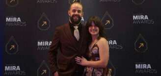 Crowfly founders Nickolai Christiansen and Jacqui Peterschmidt pose for a photo at the 2026 Mira Awards.