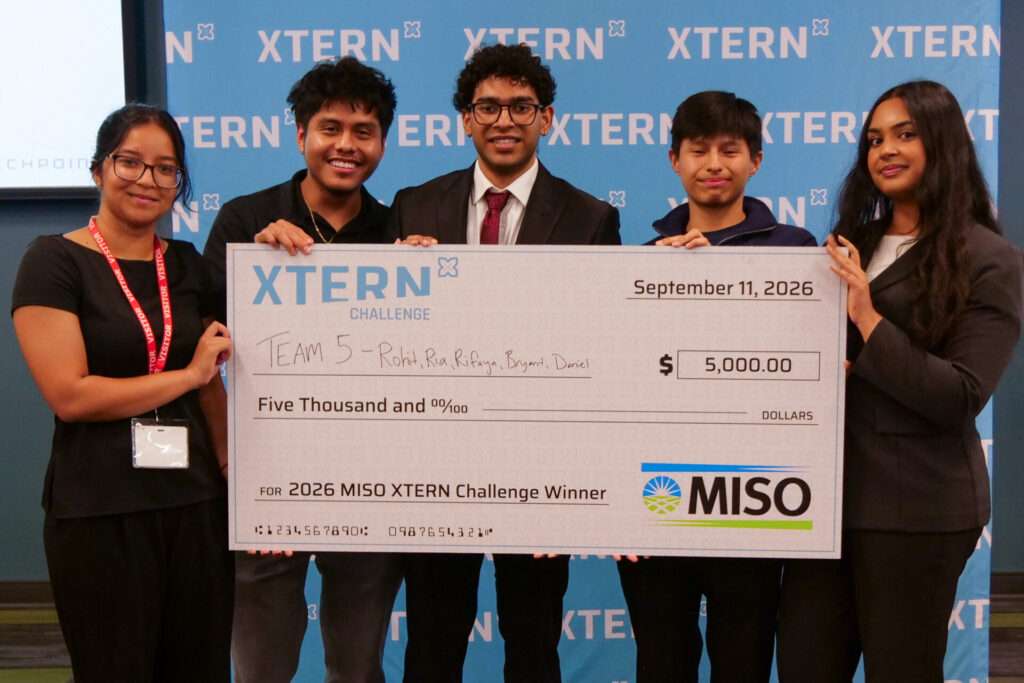 Team 5 poses with a $5,000 check after winning the 2026 MISO Xtern Challenge.